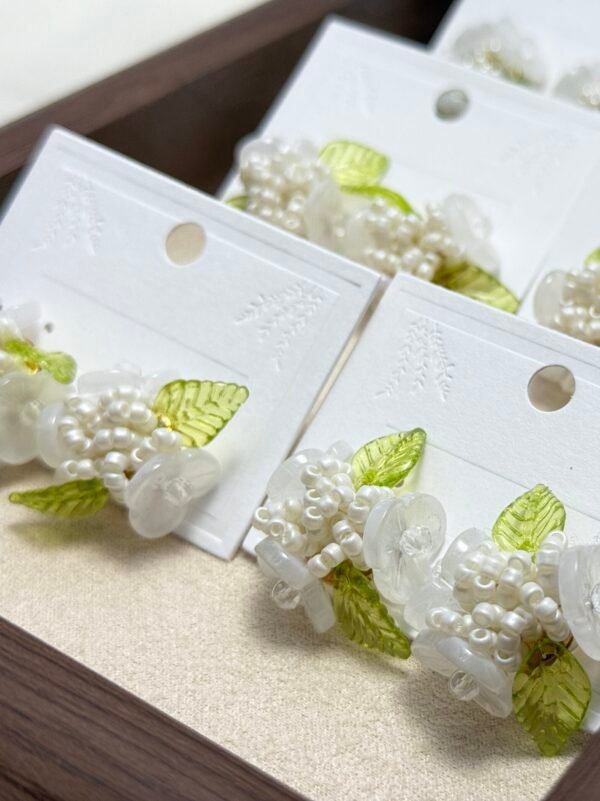 Handcrafted Pearl Bead Flower Earrings with Leaf Accents