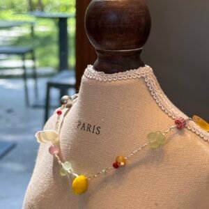 Handcrafted Rainbow Seed Bead Necklace with Lemon Charm