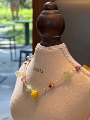 Handcrafted Rainbow Seed Bead Necklace with Lemon Charm