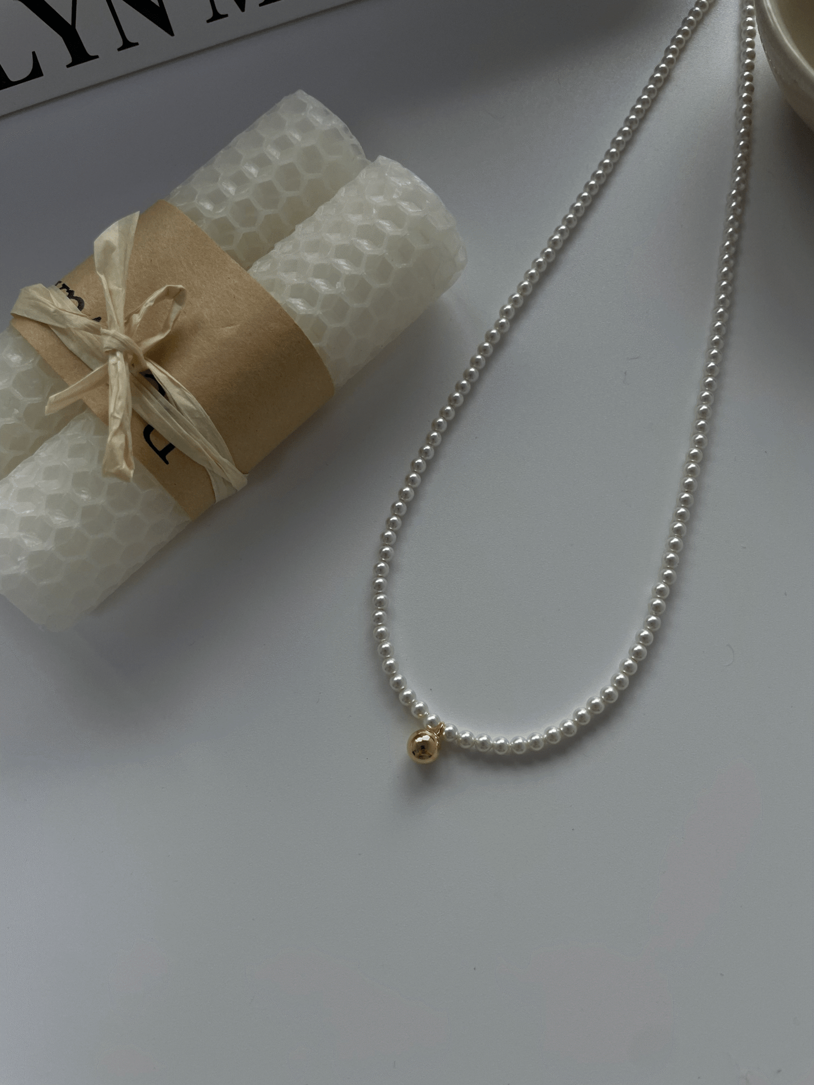 2023-05-07 163947 Baby Pearl Jingle Necklace in 14K Gold-Filled