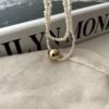 IMG_1998.HEIC Asymmetric Double-Strand Seed Pearl Bracelet with Gold Orb in 18K Gold‑Plated Sterling Silver