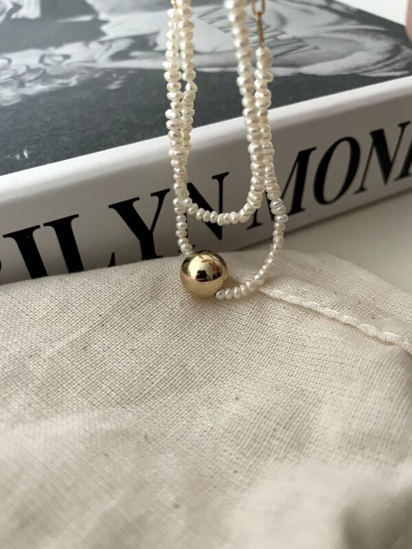 IMG_1998.HEIC Asymmetric Double-Strand Seed Pearl Bracelet with Gold Orb in 18K Gold‑Plated Sterling Silver