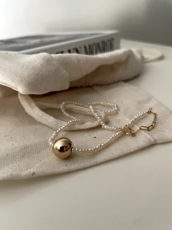 IMG_2003.HEIC Asymmetric Double-Strand Seed Pearl Bracelet with Gold Orb in 18K Gold‑Plated Sterling Silver