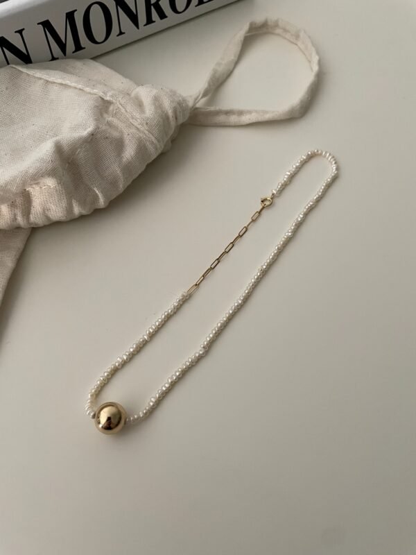 IMG_2008.HEIC Asymmetric Double-Strand Seed Pearl Bracelet with Gold Orb in 18K Gold‑Plated Sterling Silver